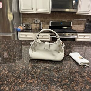 Dooney and bourke with matching wallet.